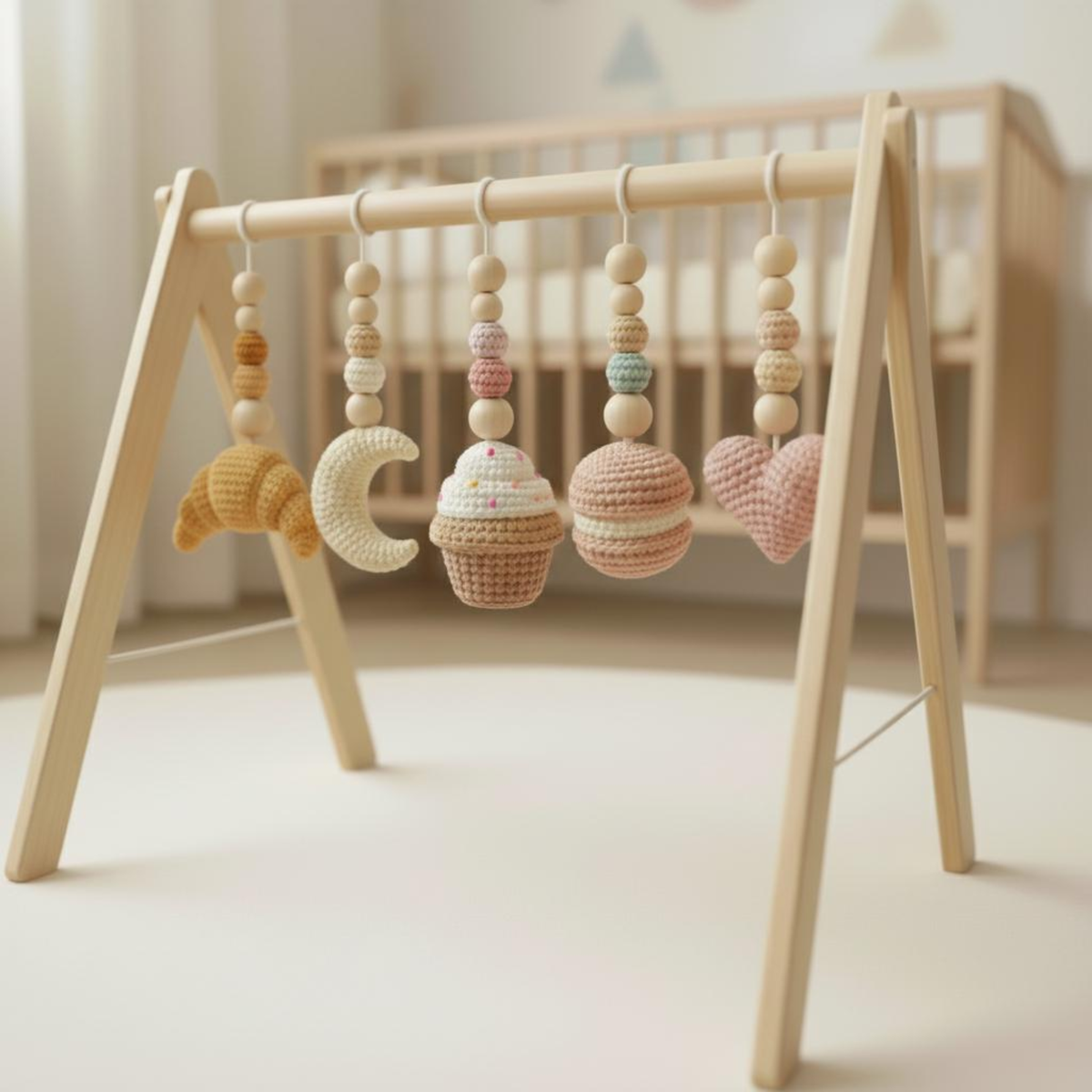 Pastel crochet baby gym toys with croissant moon cupcake macaron and heart