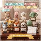 A collection of crocheted plush animal toys arranged on a wooden surface, each holding a custom sign. The plushies include a teddy bear, rabbit, sheep, elephant, giraffe, lion, panda, koala, and a horse, with quotes like 'YOU ARE MY HOME', 'LOVE YOU ALWAYS', and 'MY FIRST LOVE'.