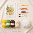 Crochet kit contents arranged on a cream fabric background, including a crochet pattern booklet, hook, scissors, glue, yarn balls in yellow, green, brown, and cream, knitting needles, stitch markers, and a ball of white puffy yarn. Text at the bottom reads 'EVERYTHING INCLUDED'.