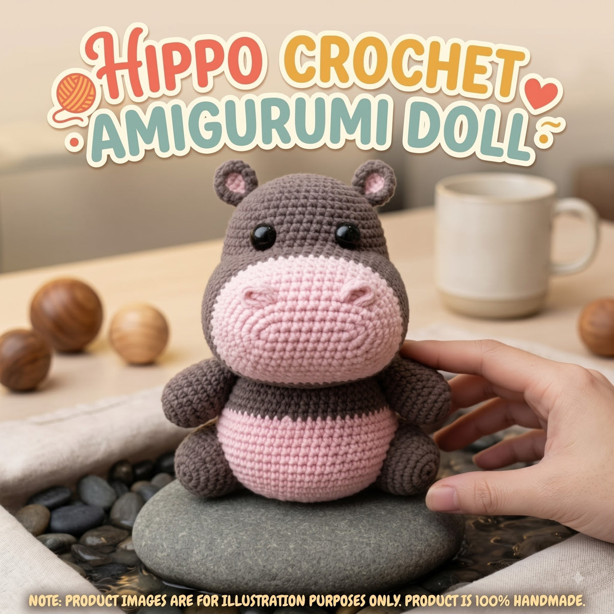 A crocheted hippo amigurumi doll sits on a stone in a styled tabletop scene, with a human hand touching it. Large text at the top reads “Hippo Crochet Amigurumi Doll,” and a note at the bottom says product images are for illustration purposes only.