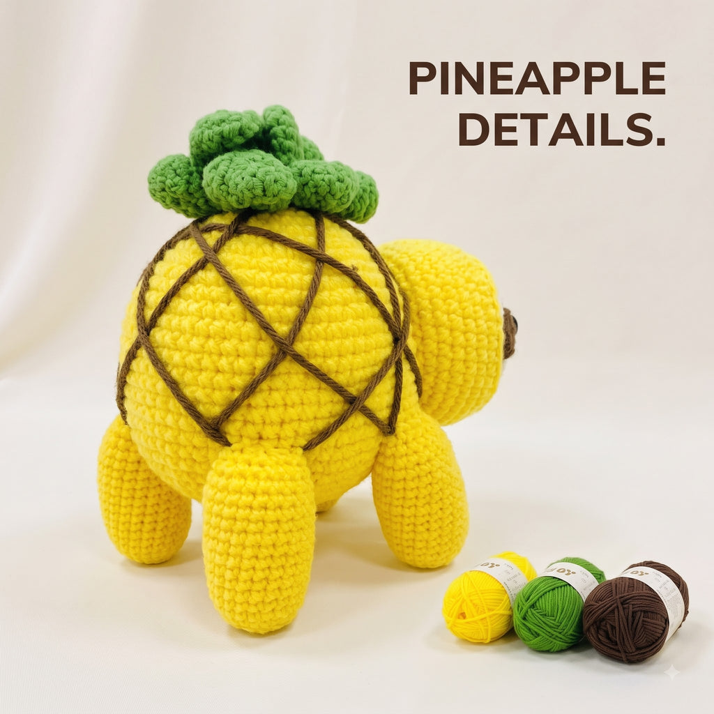 A crocheted pineapple-shaped plush toy shown from the back on a white studio background, with the text 'PINEAPPLE DETAILS.' above it and three yarn balls in yellow, green, and brown at the lower right.