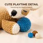 A crocheted plush toy in tan and cream with a blue ball, plus three small yarn balls, on a soft beige background with the text 'CUTE PLAYTIME DETAIL' and 'Everything You Need to Make It'.