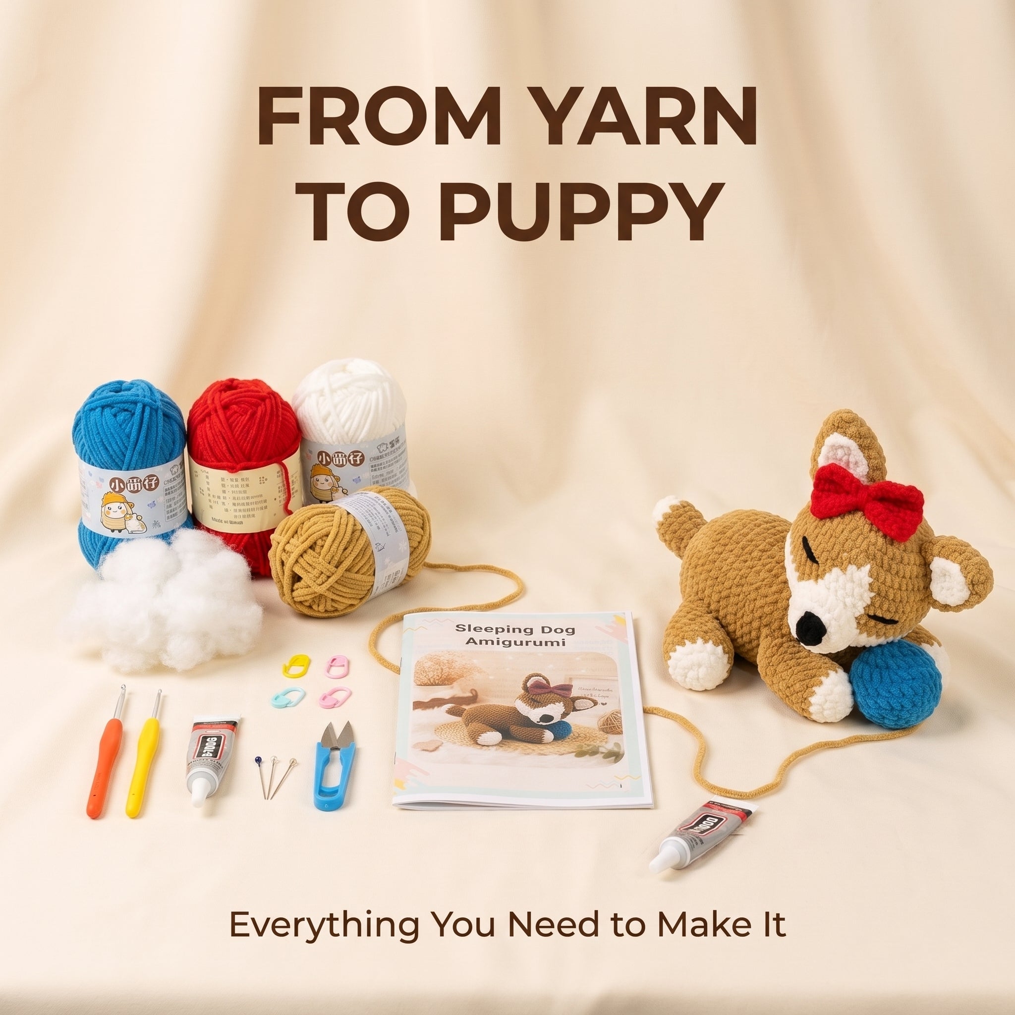 A flat-lay product presentation of a dog amigurumi kit titled 'FROM YARN TO PUPPY'. The kit includes blue, red, and white yarn, tan yarn, white stuffing, crochet hooks, a tube of glue, a booklet, and a completed crocheted puppy dog toy holding a blue ball.