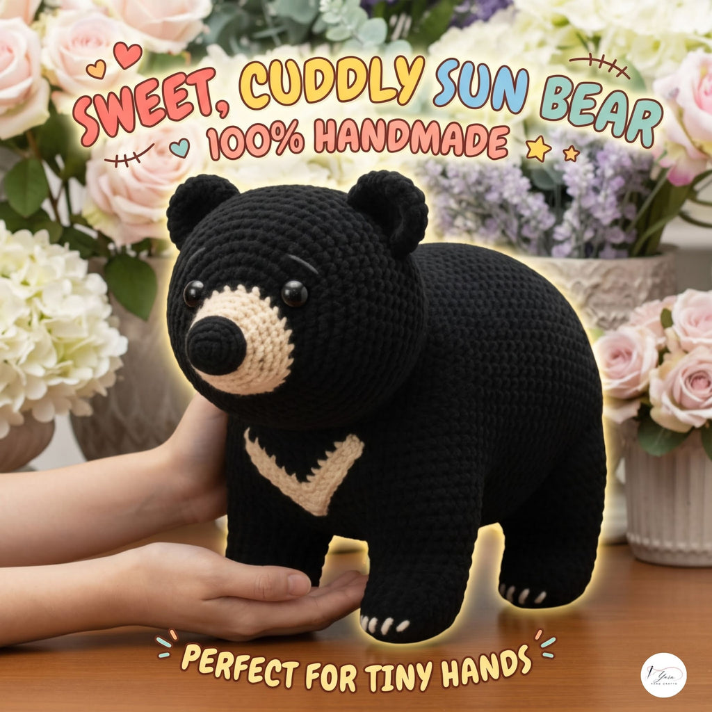 A crocheted sun bear plush toy being held gently by hands, with decorative flowers in the background and text overlays reading 'Sweet, Cuddly Sun Bear 100% Handmade' and 'Perfect for Tiny Hands.'.