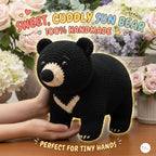 A crocheted sun bear plush toy being held gently by hands, with decorative flowers in the background and text overlays reading 'Sweet, Cuddly Sun Bear 100% Handmade' and 'Perfect for Tiny Hands.'.