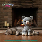Handmade 12 inches 30cm grey tabby cat crochet amigurumi plush doll sitting next to a real tabby cat in front of a fireplace