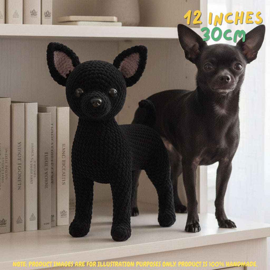 A black crocheted dog toy stands on a white shelf next to a real black Chihuahua dog. The image includes text overlays indicating the size of the toy as 12 inches (30 cm) and a small disclaimer at the bottom.