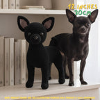 A black crocheted dog toy stands on a white shelf next to a real black Chihuahua dog. The image includes text overlays indicating the size of the toy as 12 inches (30 cm) and a small disclaimer at the bottom.