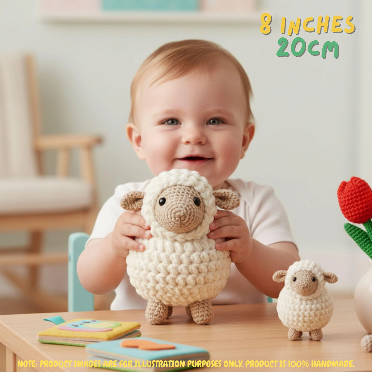 A baby sitting at a table holds a crocheted sheep toy while another smaller crocheted sheep sits on the table. The scene is indoors with a blurred chair in the background, and text in the top right reads '8 INCHES 20CM'.