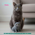 A gray cat sits on a light floor next to a small crocheted gray cat toy. The photo includes size text reading 3 inches 16cm and a note at the bottom stating product images are for illustration purposes only.