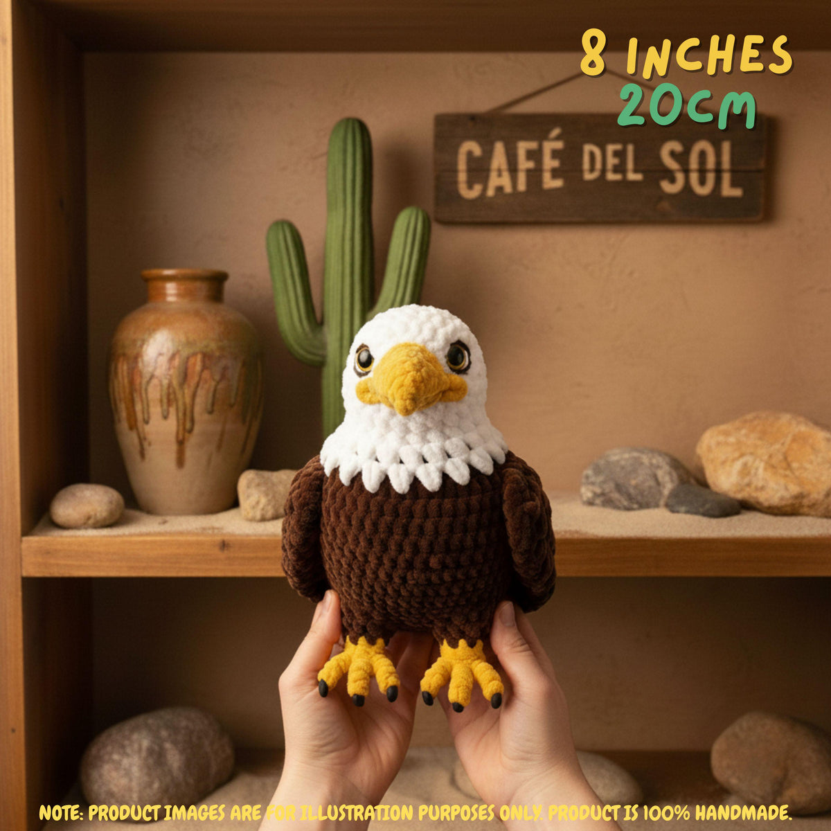 A crocheted eagle toy held up by two hands in front of a rustic wooden shelf display. The text overlay reads '8 INCHES 20cm'.