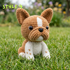Handmade brown and white spotted crochet French Bulldog amigurumi plushie with "STYLE 4" text overlay sitting on green grass.