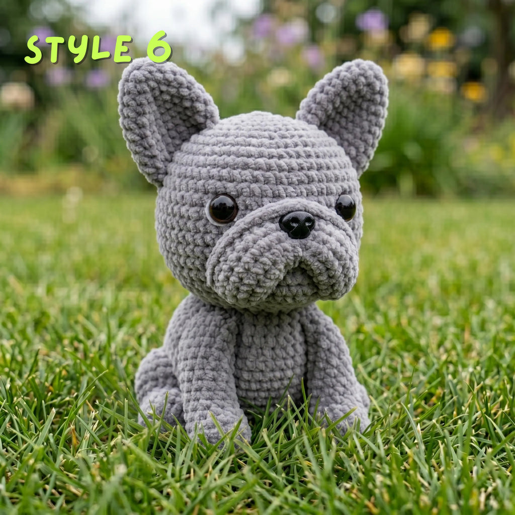 Handmade solid grey crochet French Bulldog amigurumi plushie with "STYLE 6" text overlay sitting on green grass.