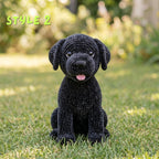 A black crocheted dog toy sits on green grass outdoors with a blurred garden background. The text 'STYLE 2' appears in the top left corner.