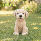 A crocheted puppy doll sits on green grass outdoors with a blurred garden background. The text 'STYLE 1' appears in the upper left corner.